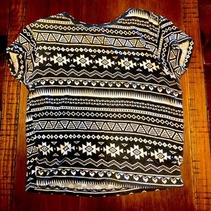 A grey and white patterned crop top